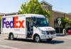 FedEx delivery truck parked on a city street