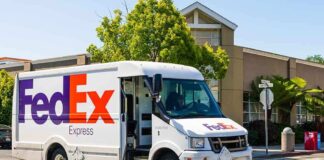 FedEx delivery truck parked on a city street