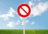 Mar-a-Lago No-Fly Zone UPENDS Neighborhood A no entry sign on a grassy field under a clear blue sky