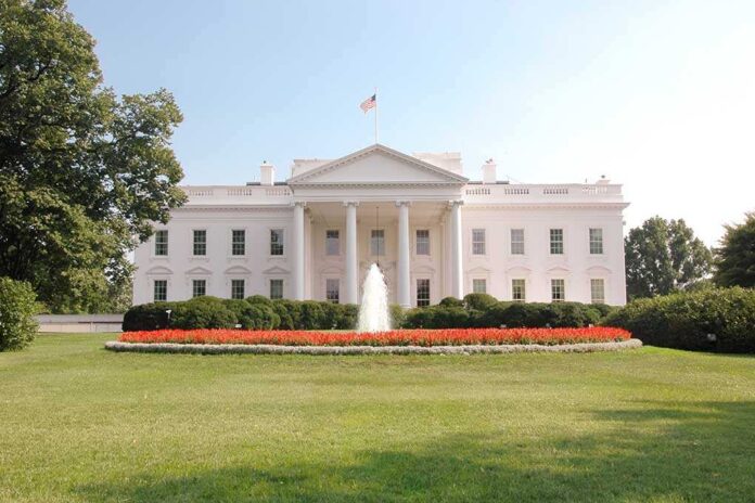 The White House surrounded by manicured gardens and a fountain