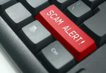 Terrifying New Pension Trap Emerges Close-up of keyboard with red SCAM ALERT key.