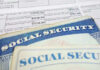 Social Security Crisis: MILLIONS Face Benefit Slashes Social security cards on top of tax documents
