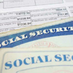Social security cards on top of tax documents