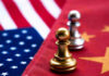 China’s INTIMIDATION War Against US Senator Chess pawns on USA and China flags.