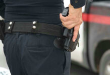 Fast Food Parking Lot AMBUSH Ends in MURDER Person holding a gun in a holster.