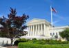 Supreme Court Faces Birthright Citizenship Showdown Supreme Court building with American flag and surrounding greenery