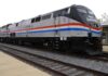 Freight Train PUSHES Car Quarter-Mile — Woman SURVIVES Amtrak locomotive parked at a railway station