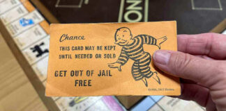 Monopoly game card get out of jail free