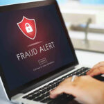 CEO’s KICKBACK EXPOSED: Healthcare Sector STUNNED Laptop displaying fraud alert warning on screen