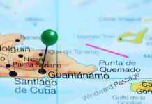 Cuban Dictator Threatens America — Vows to Make the U.S. Pay Map with pin on Guantánamo, Cuba.