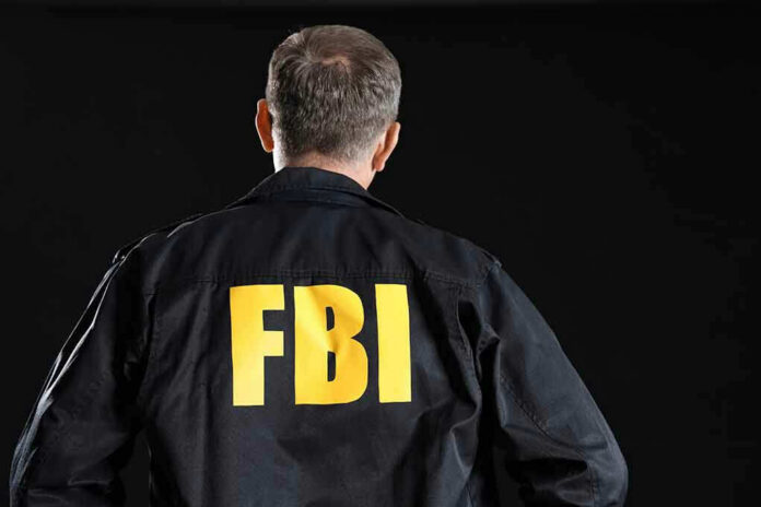 FBI agent with back facing the camera.