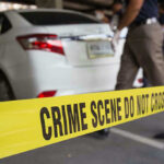 Four Innocents KILLED—Border Failure Revealed Crime scene tape blocking off white sedan.