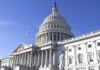The U.S. Capitol building with a clear blue sky in the background
