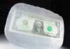Maduro’s Assets FROZEN – Switzerland Strikes A one dollar bill encased in a block of ice