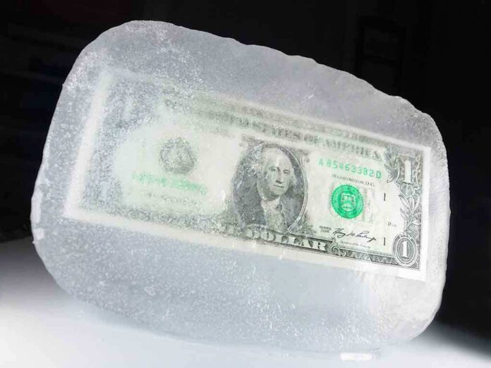 shutterstock_24253093.jpg A one dollar bill encased in a block of ice