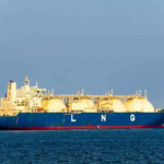 LNG tanker ship sailing on open sea.