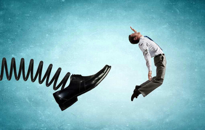 353283212 Man gets kicked by oversized shoe on spring.