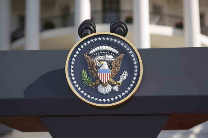 Close-up of the presidential seal on a podium