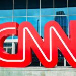 CNN Bombing Narrative COLLIDES With Reality Large red CNN logo in front of a glass building