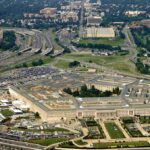 Aerial view of the Pentagon surrounded by highways and urban areas