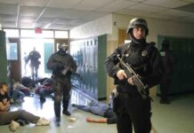 ISIS-Linked Gunman Storms Classroom Police officers responding to a school emergency with students on the floor