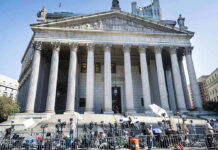 Weinstein Mistrial: Justice System Exposed? Courthouse facade with media crews setting up outside.