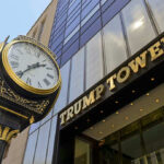 Tower Tbilisi Sparks Raging Protests Clock in front of Trump Tower building entrance.