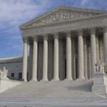 Ex-NFL Player Orchestrates Massive $200M Fraud The Supreme Court building featuring large columns and statues