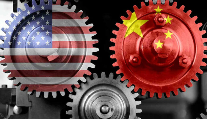 1849129522-1 Interlocking gears with USA and China flags.