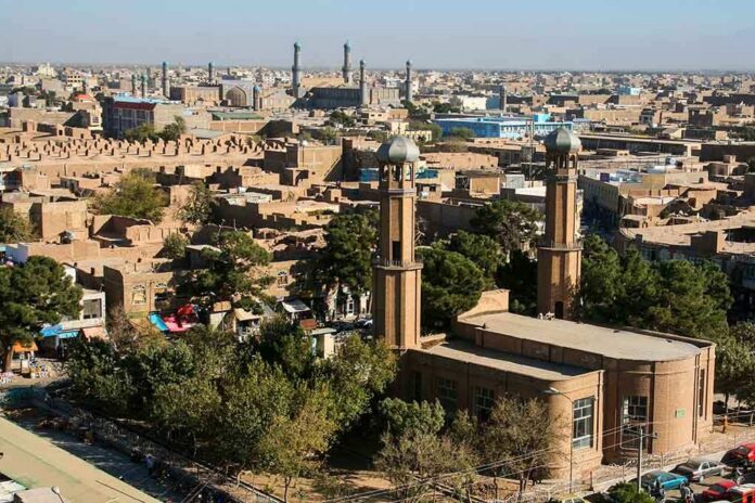 shutterstock_203084620 Aerial view of a city featuring traditional buildings and minarets