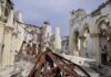 Holy War: Ukraine’s Faith Under Fire Interior view of a destroyed building with collapsed arches and debris