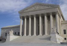 Free Speech Under Fire in Jersey The Supreme Court building featuring large columns and statues