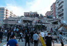 Pentagon Data Disaster Hits School People at a collapsed building after an earthquake.