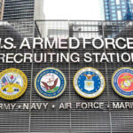 Pentagon’s 15-Year Recruiting High—But Here’s The Catch Sign for U.S. Armed Forces Recruiting Station.