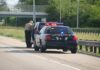 iPhone Charger Becomes Lifesaver On Turnpike Police officer conducting a traffic stop on a highway