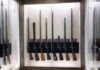 Museum Meltdown: Congress Targets ‘Woke’ History Display case with a row of antique muskets