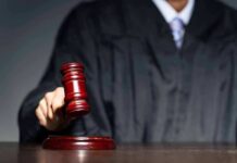 Leaked Records Target Senate Nominee’s Wife Judge with gavel striking sound block