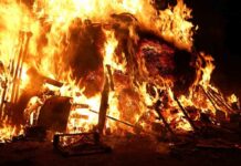 Holiday Fun Turns Deadly A large fire engulfing debris at night