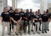 Foreign Terror Cartel Hits U.S. Heartland Group of law enforcement officers with tactical gear and a K-9