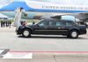 Trump Used Air Force One as Decoy After Iranian Assassination Threat Presidential motorcade limousine parked beside large blue and white aircraft