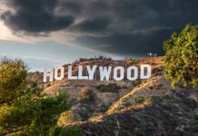Hollywood Actor Used ‘Casting Calls’ To Lure Young Victims Hollywood sign on hillside under dramatic clouds