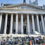 Judge SLAPS Down Trump Rename Reporters and photographers gathered outside a neoclassical courthouse