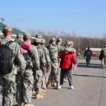 Attempted Murder Verdict Rattles Army Ranks Soldiers in uniform line up outdoors with gear