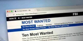 Computer screen showing an FBI Most Wanted webpage