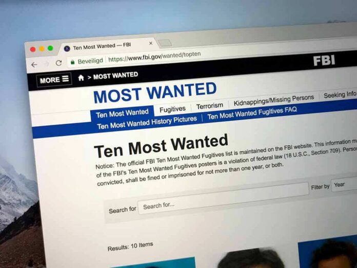 shutterstock_1163296018 Computer screen showing an FBI Most Wanted webpage