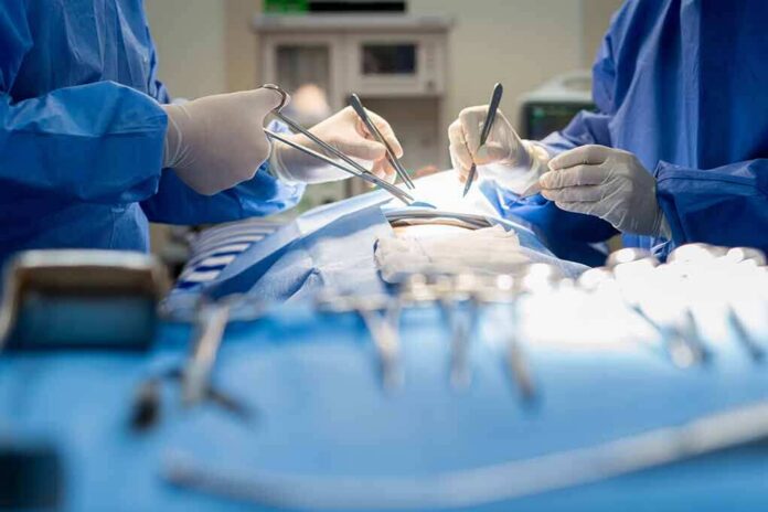 Surgeons performing an operation with instruments