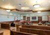 911 Call BLOWS APART Viral TikTok Story?! Empty courtroom with wooden benches and judge's bench