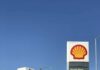 Shell gas station with price sign on a sunny day