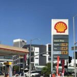 Shell gas station with price sign on a sunny day