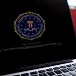 Laptop screen displaying FBI seal